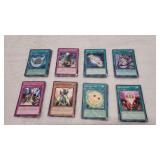 8 Stacks Of Yu-Gi-Oh Cards