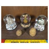 Snow globe golden pinecone