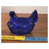 Hen on a nest colbolt blue