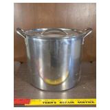 large stainless steel stock pot with a lid