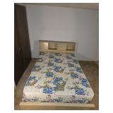 Full size blonde wood bed frame with a headboard