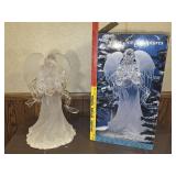Lighted holiday ice sculpture Angel