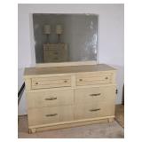 modern blonde wood dresser with a matching