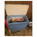 blue woven wicker laundry hamper with a padded