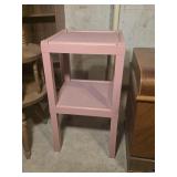Pink plastic side table