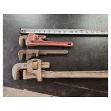 Three Metal Pipe Wrenches in Assorted Sizes