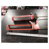 Two Red Metal Manual Caulking Guns