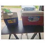Two Igloo Coolers Including Playmate Elite and Island Breeze Models