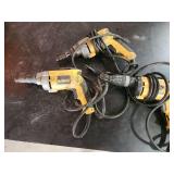 Three DeWalt Corded Power Drills
