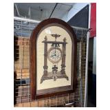 Needle Point in Frame of Clock Scene