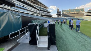 Members of the Atlantic Seed Association walk along the sidelines of Lincoln Financial Field in Philadelphia, PA to see the turf on the playing surface. (Chris Lusvardi photos)