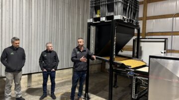 From left, BioLumic CEO Steve Sibulkin, CSO Jason Wargent, and Lead Operations Engineer Jason Phillips provide a demonstration of the company's technology March 6 at the Gro Alliance seed production facility in Cuba City, WI. (Chris Lusvardi)