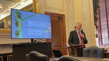 Georg Jander addresses an audience in the offices of the U.S. Senate Committee on Agriculture, Nutrition, and Forestry.