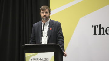 Jarrod Hardke, extension rice agronomist for the U of A System Division of Agriculture, addresses attendees at the 2024 USA Rice Outlook Conference in Little Rock. (Division of Agriculture photo)