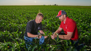 LG Seeds agronomist Jed Norman (right) encourages farmers to think through harvest goals when planning planting order but recognize field conditions can force plans to change.