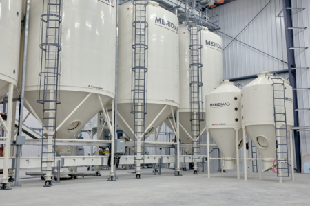 Packaging bins on load cells for dispensing precise weights.