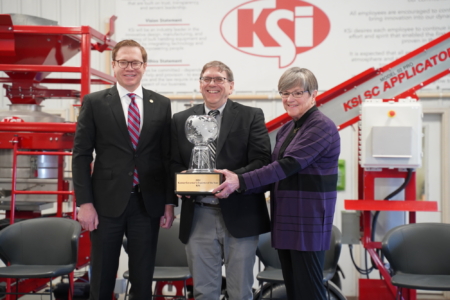 From left, Kansas Lt. Gov David Toland, KSi CEO Paul Kaeb, and Kansas Gov. Laura Kelly.