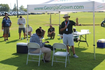 UGA Extension Turfgrass Specialist Clint Waltz speaks to a group about a new weed species in Georgia lawns. “It is our hope that sharing those with others will lead to improved practices and stewardship within the industry,” said Waltz. (Photo by Ashley Biles)