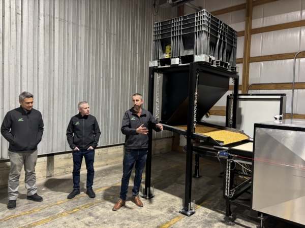 From left, BioLumic CEO Steve Sibulkin, CSO Jason Wargent, and Lead Operations Engineer Jason Phillips provide a demonstration of the company's technology March 6 at the Gro Alliance seed production facility in Cuba City, WI. (Chris Lusvardi)