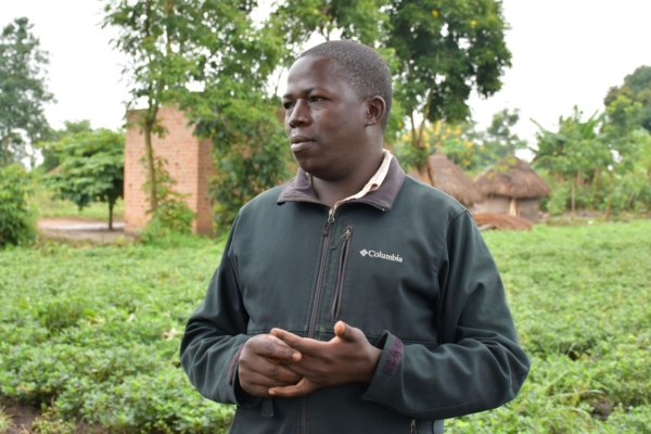 Dennis, a farmer from Teyawo village, has embraced improved, drought-tolerant varieties of ground nuts and finger millet. (Photo: Marion Aluoch/CIMMYT)