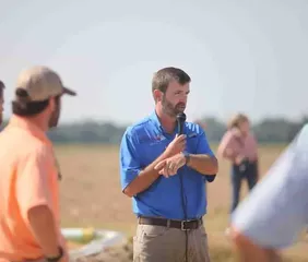 Jarrod Hardke, extension rice agronomist for the University of Arkansas System Division of Agriculture, speaks to attendees at the 2025 Rice Research and Extension Field Day in Stuttgart. Photo from The Wynne Progress
