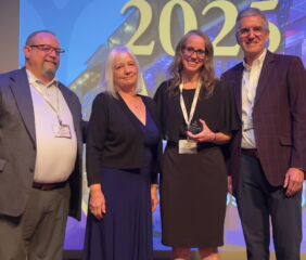From left: Evan Trump, Paula Fetherston (accepting NAMA Honorary Member Award on behalf of Dan Fetherston), Andrea Vauble, and NAMA Chair Tedd Kruse (ADM Milling and Baking Solutions).