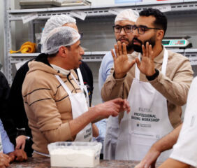 U.S. Wheat Associates Milling and Baking Specialist Zakaria Jallali answers questions from Egyptian bakers during the HRS workshop in Suez. Photo credit: USW.