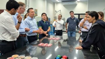 Croda President of Life Sciences Thomas Reiermeir, Incotec Global Business Director Bruno Hoetgebaum and Croda Non-Executive Director Nawal Ouzren at the updated labs with members of the team from Incotec Brazil. Photo credit: Incotec.