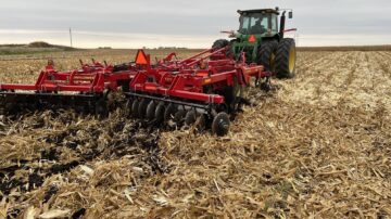 Tractor and tillage equipment prepare a field in spring before planting the next crop. Photo credit: Alejo Ruiz/Iowa State University.