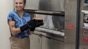Maria Rottersman of UC Davis with loaf made without alpha-gliadin proteins. (c) Alejandra Andrade, California Wheat Commission