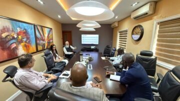 U.S. Grains & BioProducts Council (USGBC) Deputy Regional Director for Africa Mohamed Salah Bouthour (near, leftmost) recently traveled to Ghana and Nigeria to examine the results of a feed trial using U.S. distiller's dried grains with solubles (DDGS). Image courtesy of USGBC.