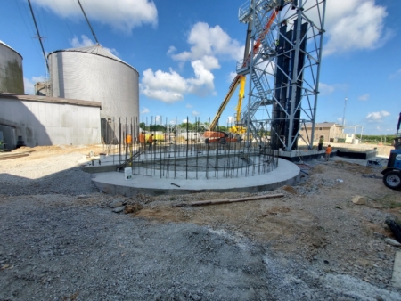 36-foot wet bin foundation under construction, with additional geotechnical piers installed for soil stabilization.