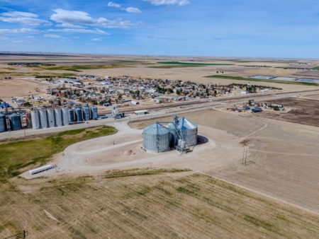 An aerial view shows the new storage expansion alongside Peetz Farmers Co-op’s existing grain handling operation.