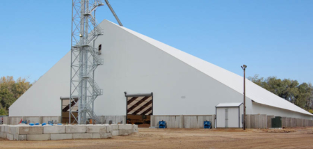 Large flat storage facilities are designed for high-capacity grain handling and year-round use to provide fast, flexible storage solutions when needed. Photos courtesy of Accu-Steel.