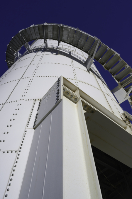 Fully automated drive-through mill feed loadout system.