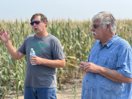 Ryan and Ray Flickner, respectively the sixth and fifth generations in a family that has pioneered Kansas agriculture, continue to build on the family's legacy through the Flickner Innovation Farm near Moundridge in central Kansas. Photo credit: K-State.