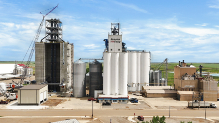 The new 630,000-bushel four-pack slip-form elevator stands beside Scranton Equity Exchange’s existing facility in Scranton, North Dakota.