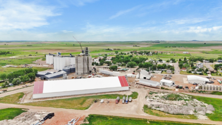 The road into Scranton, North Dakota, leads to Scranton Equity Exchange’s expanded facility. Residents in nearby Bowman have begun calling the new slip elevator the “castle on the prairie.”