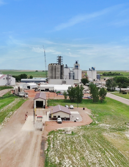 An aerial view of Scranton Equity Exchange’s expanded facility outside Scranton, North Dakota. The new $23 million slip-form elevator rises behind the cooperative’s working operation.