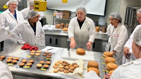 During afternoon breakout sessions, attendees rolled up their sleeves and performed flour and dough testing, baking trials and ingredient functionality assessments. Image courtesy of U.S. Wheat Associates.