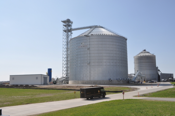 New 2.2-million-bushel corn storage tank at Golden Grain Energy LLC in Mason City, IA, with receiving building at right. Aerial photo by JH Photography, Spencer, IA.