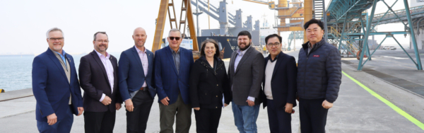 The USW North Asia Board Team pauses for a photo at the Pyeongtaek-Dangjin Port, a major international trade port located south of Seoul, South Korea. The Board Team is made up of wheat farmers from Kansas, North Dakota and Montana, along with USW Director of Communications Julia Debes. This part of the journey was hosted by USW Country Director in South Korea Channy Bae (second from right). Photo credit: U.S. Wheat Associates.
