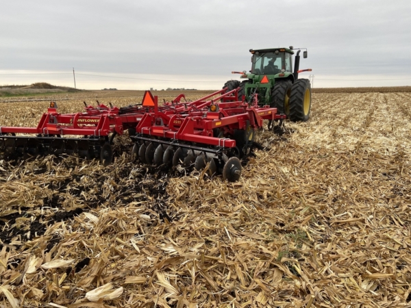 Tractor and tillage equipment prepare a field in spring before planting the next crop. Photo credit: Alejo Ruiz/Iowa State University.