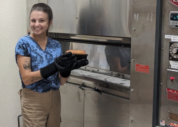 Maria Rottersman of UC Davis with loaf made without alpha-gliadin proteins. (c) Alejandra Andrade, California Wheat Commission