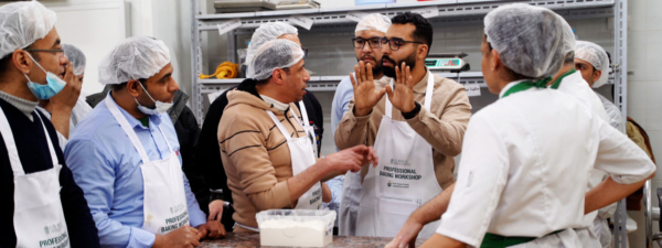 U.S. Wheat Associates Milling and Baking Specialist Zakaria Jallali answers questions from Egyptian bakers during the HRS workshop in Suez. Photo credit: USW.