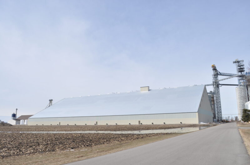 New flat storage building at Ulen, MN was constructed directly over an existing temporary storage pile. It currently can hold 3 million bushels and, with modifications, could hold 3.5 million.
