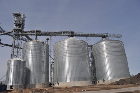 Approximately 2 million bushels of new upright steel storage plus enclosed belt conveyors at Ulen, MN. Ground-level photos by Ed Zdrojewski.