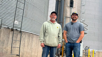 Drew Yanish and his father, Bruce, of Howard Farmers Coop in Howard SD.