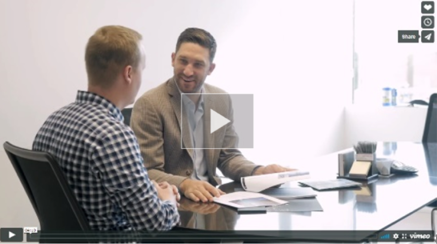 Investors discussing project in a board room