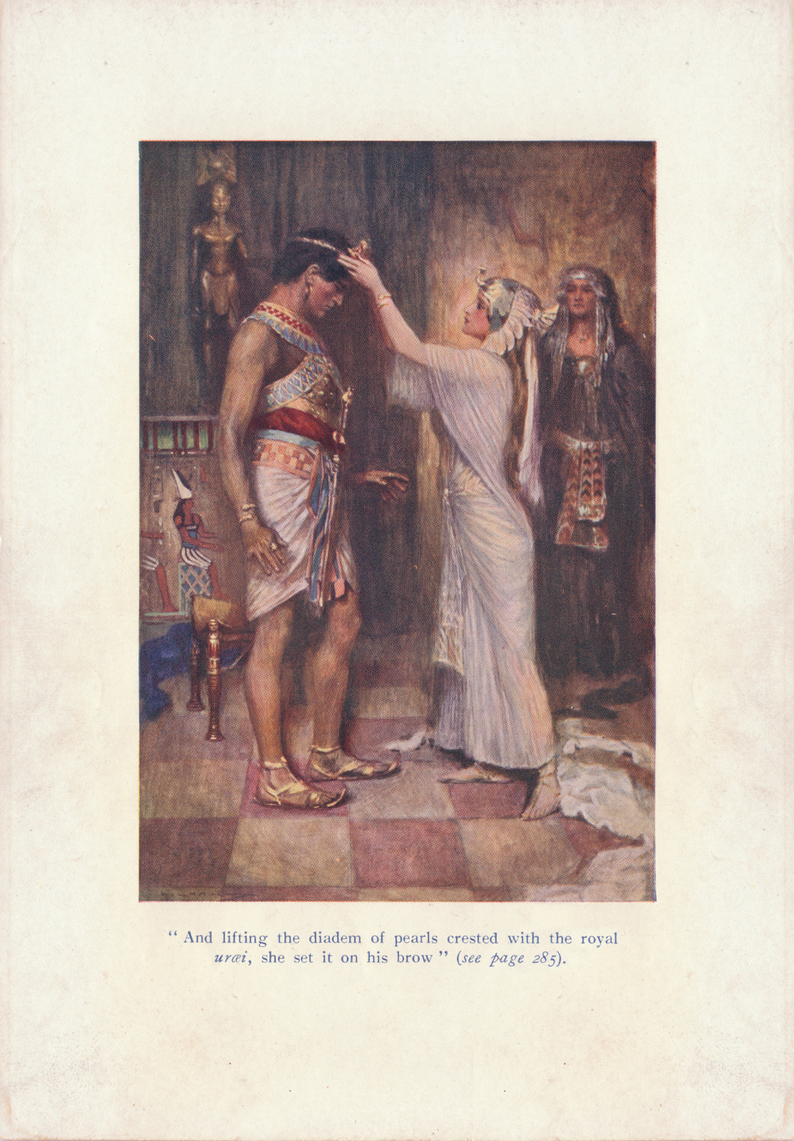 And lifting the diadem of pearls crested with the royal uraei, she set it on his brow. Andliftingfrontispiece